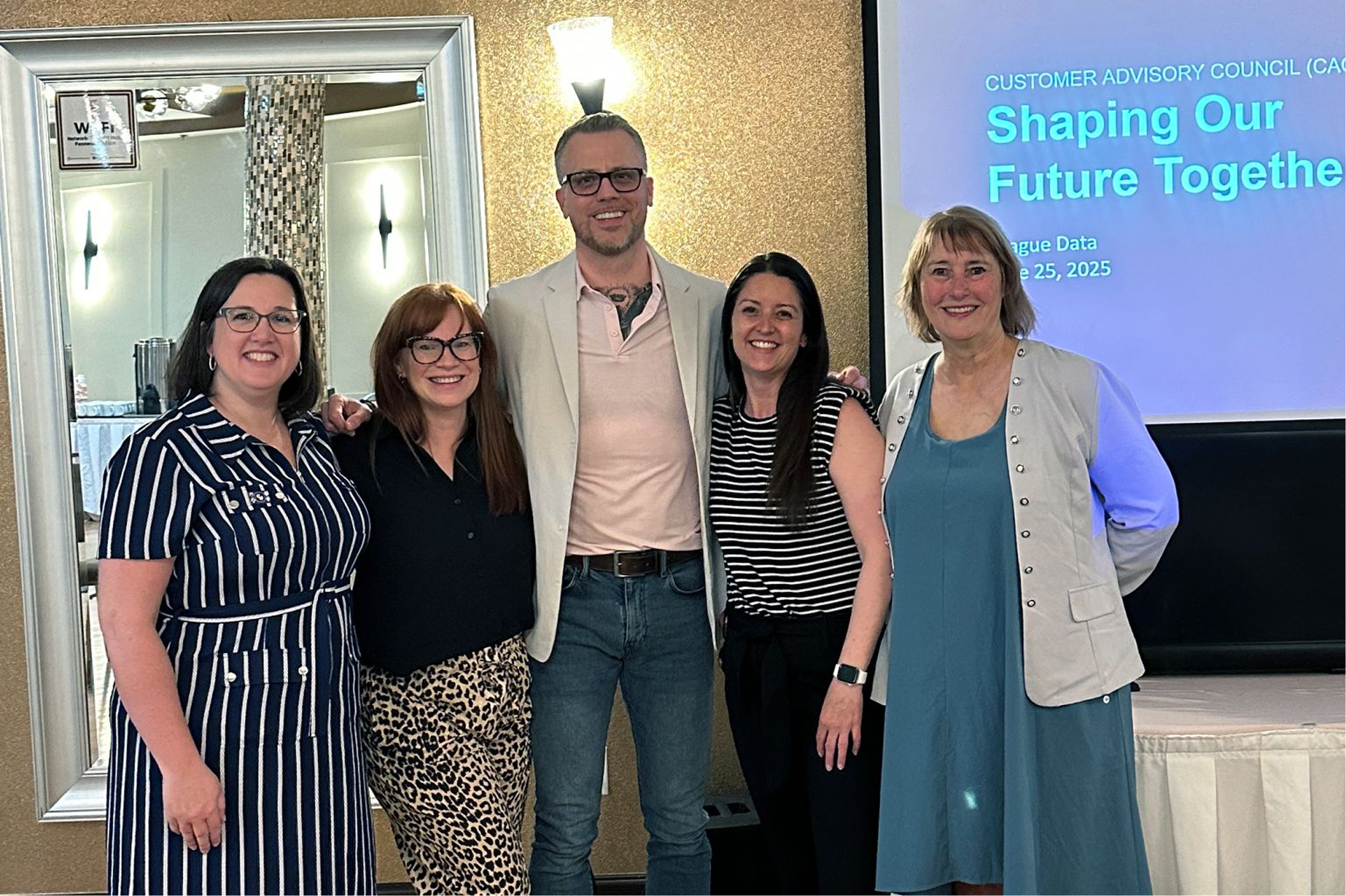 Jamie Gerrard with three members of League Data's Engagement team and their Head of Customer Experience.